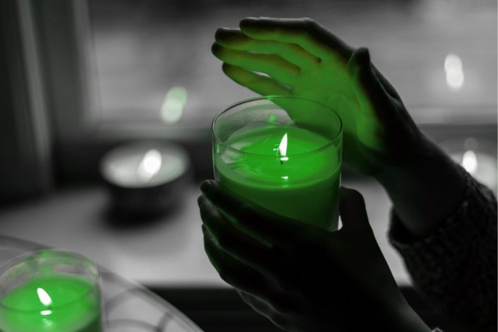A candle being held