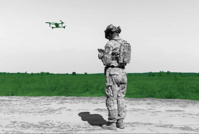 A drone operator from field medicine division Hospitallers launch a quadrocopter to search for the wounded on the battlefield. Field tests of THeMIS crawler drone