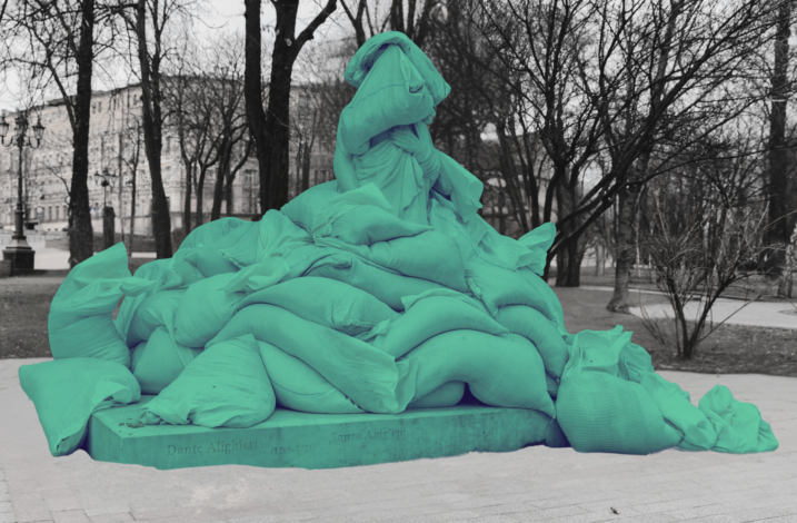 A statue of Dante Alighieri in Ukraine, covered in sandbags to protect from damage.